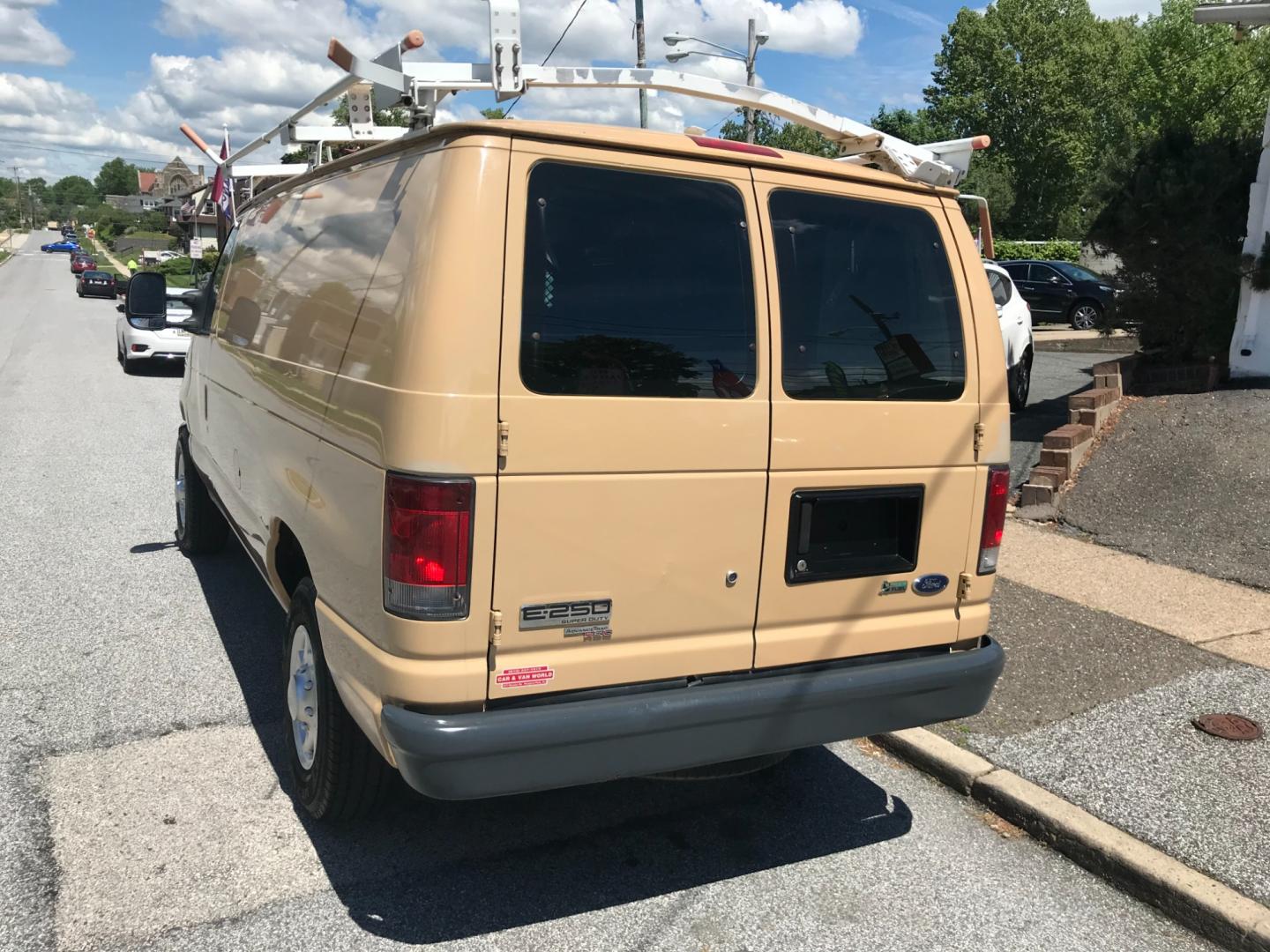 2011 Tan /Gray Ford E-Series Van E250 (1FTNE2EW5BD) with an 4.8 V8 engine, Automatic transmission, located at 577 Chester Pike, Prospect Park, PA, 19076, (610) 237-1015, 39.886154, -75.302338 - 2011 Ford E250 Cargo Van: Ladder racks, shelving, heavy duty partition, power inverter, fully metal body, FLEET MAINTAINED, runs LIKE NEW! This vehicle comes inspected and has been given a bumper to bumper safety check. It is very clean, reliable, and well maintained. We offer a unique pay plan t - Photo#5